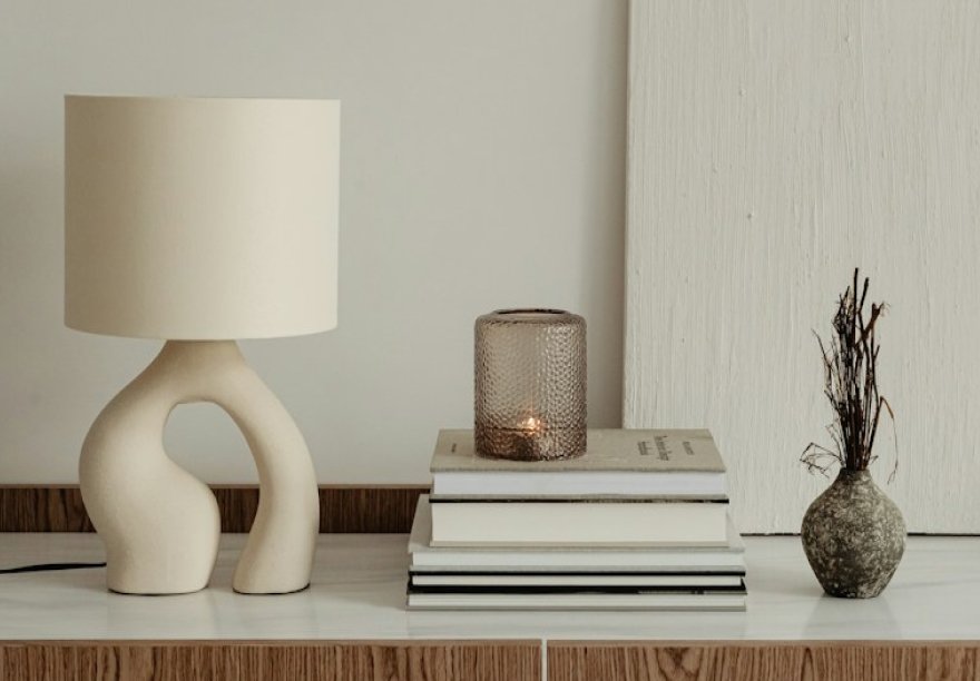 Minimal lamp and books on a styled console